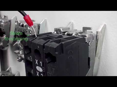 Hur man testar ljuset i Harmony seriens lamptryckknappa