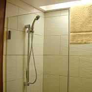 Q & A of the Day - Must these hotel consumer units in shower room be moved?