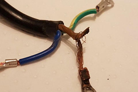 What would cause shrink back on a domestic electric fire?