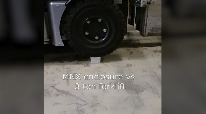MNX enclosure ran over by truck
